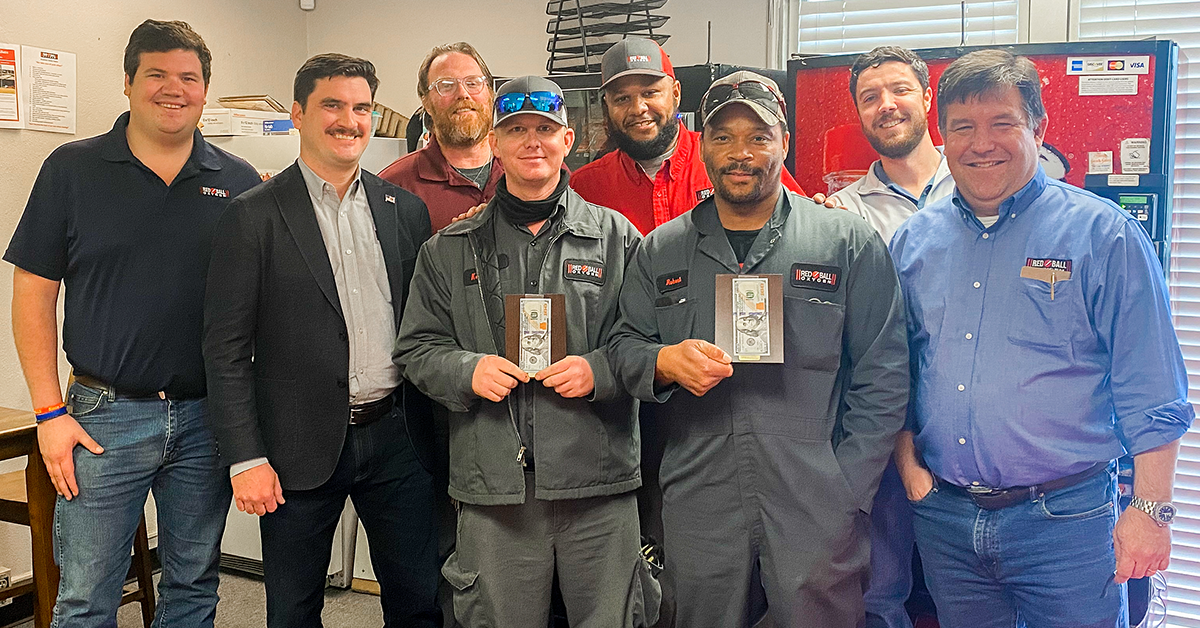 Kevin and Robert receive Red Ball's Winning with Teamwork Award for work done during the 2021 winter storm.